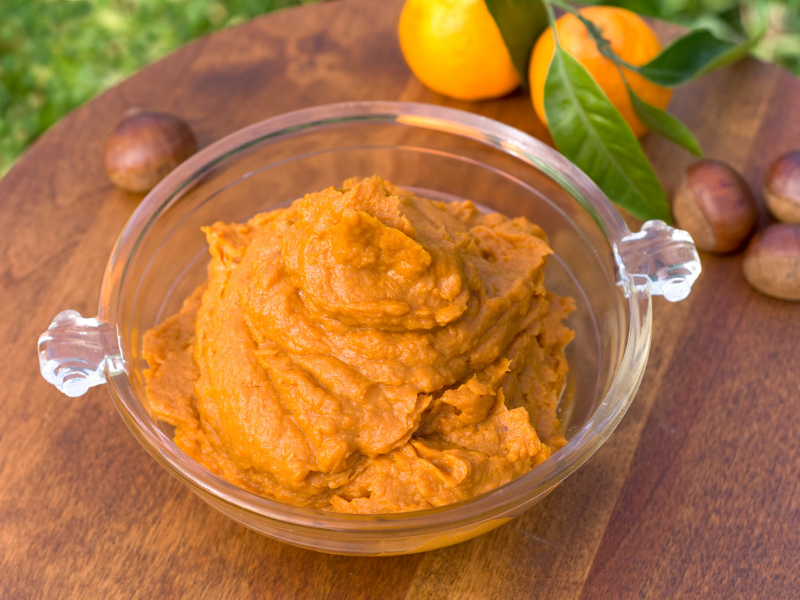 bowl of mashed sweet potatoes on table