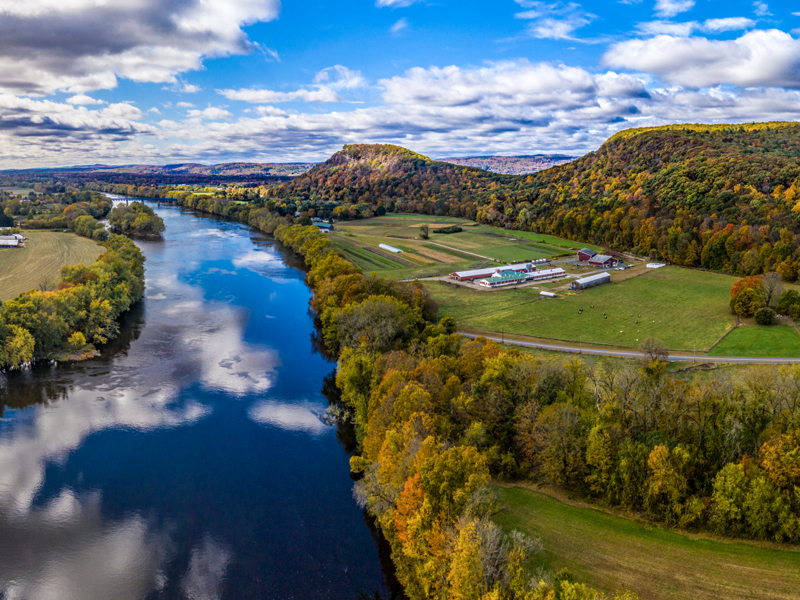 agricultural landscape with hills and river