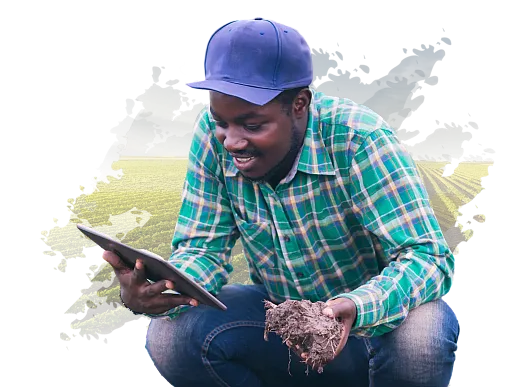 Man with tablet examining a soil sample